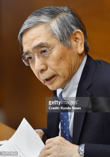 Bank of Japan Governor Haruhiko Kuroda speaks at a press conference on March 9 at the Tokyo head office of the central bank after a two-day monetary...