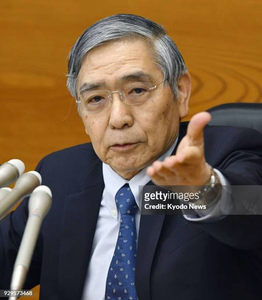 Bank of Japan Governor Haruhiko Kuroda takes a question from a reporter at a press conference on March 9 at the Tokyo head office of the central bank...