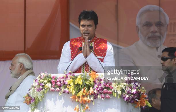 Newly appointed Tripura Chief Minister Biplab Kumar Deb gestures during the swearing-in ceremony of Tripura legislative assembly at Assam Rifles...