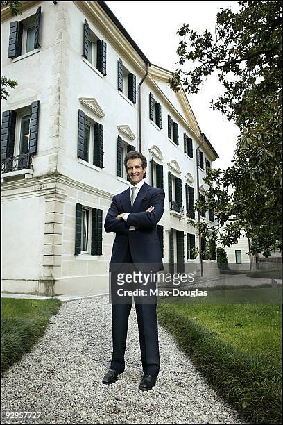 Manager Alessandro Benetton poses for a portrait shoot in Treviso on May 11, 2005.
