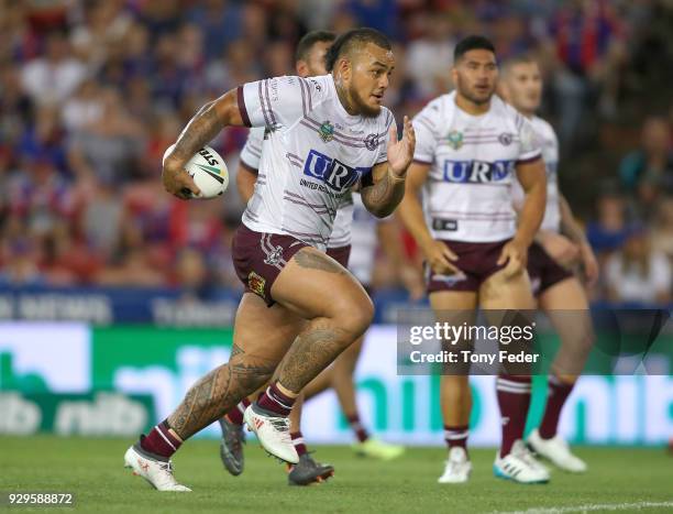 Addin Fonua-Blake runs the ball during the round one NRL match between the Newcastle Knights and the Manly Sea Eagles at McDonald Jones Stadium on...