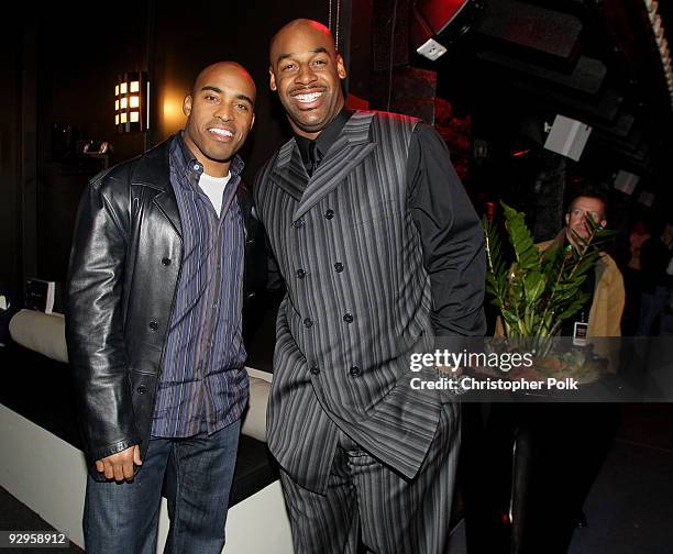 Tiki Barber and Donavan McNab attend the Ronnie Lott and Donovan McNabb Dinner at the Audi Forum on February 1, 2008 in Phoenix, Arizona.