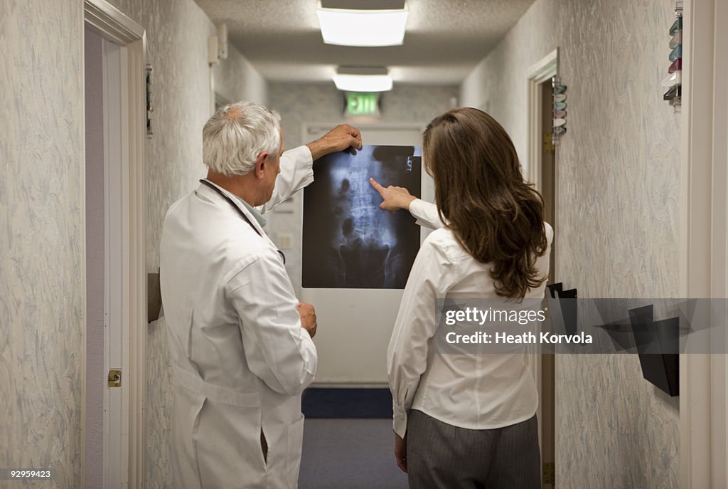Doctor and administrator with xray.