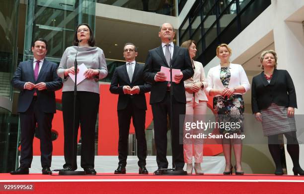 Andrea Nahles and Olaf Scholz of the German Social Democrats present SPD members of the next German government cabinet: Hubertus Heil, who is to...