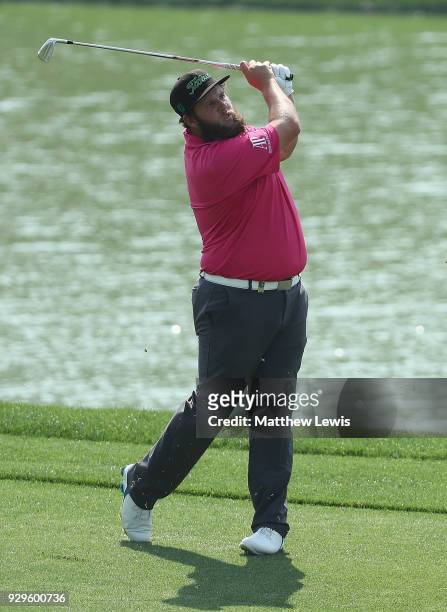 Andrew Johnston of England plays his second shot from the 6th fairway during day two of the Hero Indian Open at Dlf Golf and Country Club on March 9,...