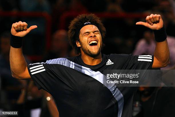 Jo-Wilfried Tsonga of France celebrates victory after winning his match against Albert Montanes of Spain during the ATP Masters Series at the Palais...