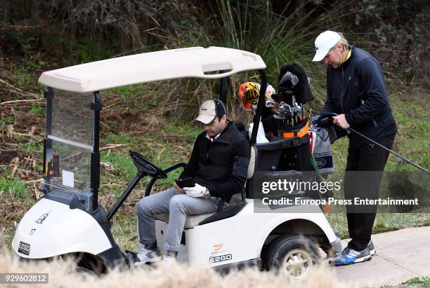 Enrique Ponce and Bernd Schuster attend the charity Golf Tournament on March 8, 2018 in Madrid, Spain.