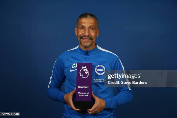 Chris Hughton, the Manager of Brighton and Hove Albion poses with the Barclays Manager of the Month Award for February 2018 at the American Express...