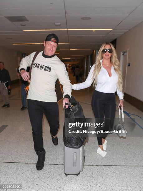 Kim Zolciak-Biermann and Kroy Biermann are seen at Los Angeles International Airport on March 08, 2018 in Los Angeles, California.