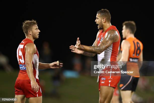 Lance Franklin of the Swans signals to team mate Kieren Jack during the JLT Community Series AFL match between the Sydney Swans and the Greater...