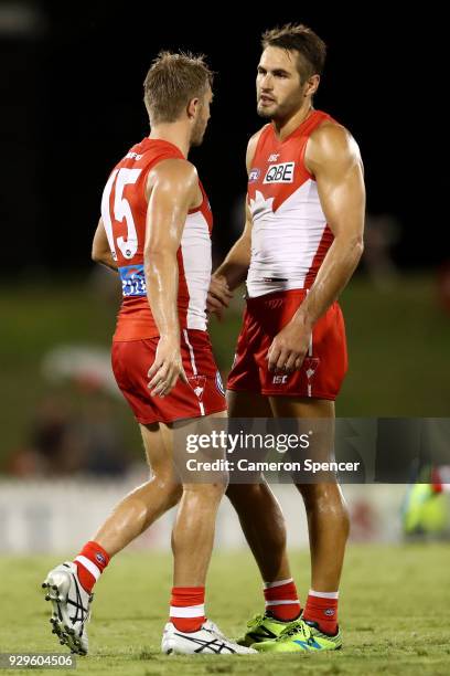 Kieren Jack of the Swans talks to team mate Josh Kennedy during the JLT Community Series AFL match between the Sydney Swans and the Greater Western...