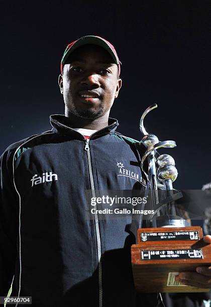 Man of the series Tatenda Taibu of Zimbabwe poses with his trophy after the second one day international match between South Africa and Zimbabwe at...