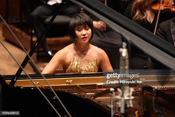 The Chinese pianist Yuja Wang performing Brahms's "Piano Concerto No 1" with the New York Philharmonic led by Jaap van Zweden at David Geffen Hall on...