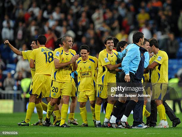 Alcorcon players celebrate after eliminating Real Madrid at the end of the Copa del Rey fourth round, second leg match between Real Madrid and AD...