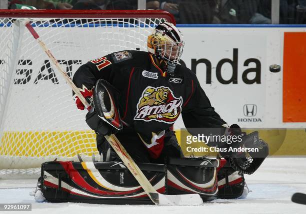 Jordan Binnington of the Owen Sound Attack watches an incoming shot in a game against the London Knights on November 6, 2009 at the John Labatt...