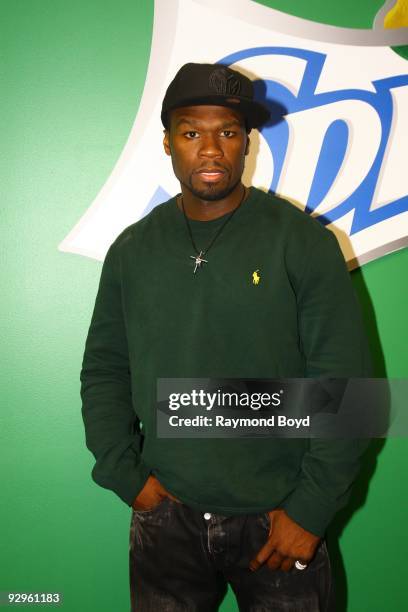 November 09: Rapper/actor Curtis "50 Cent" Jackson poses for photos while visiting the WGCI-FM "Coca-Cola Lounge" in Chicago, Illinois on November...