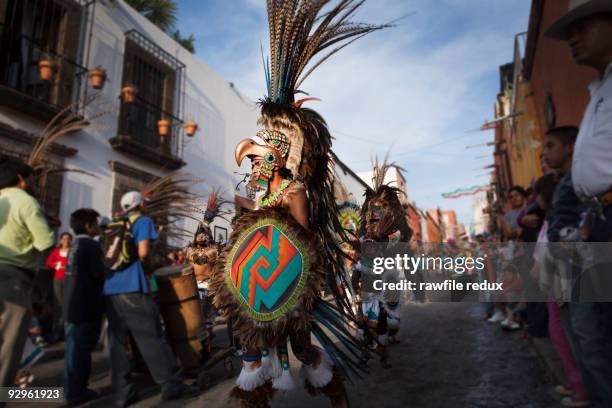 traditional dancers in aztec costumes - aztec headdress stock pictures, royalty-free photos & images