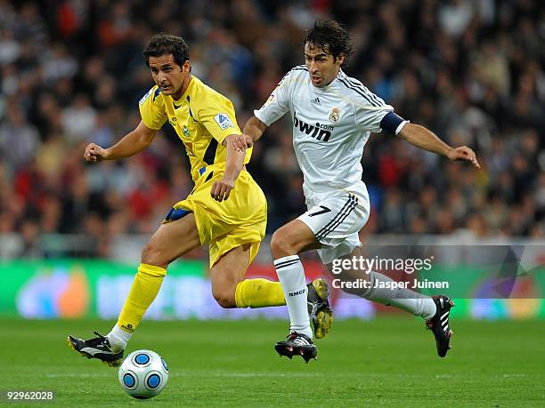 Raul Gonzalez of Real Madrid duels for the ball with Sergio Mora of AD Alcorcon during the Copa del Rey fourth round, second leg match between Real...