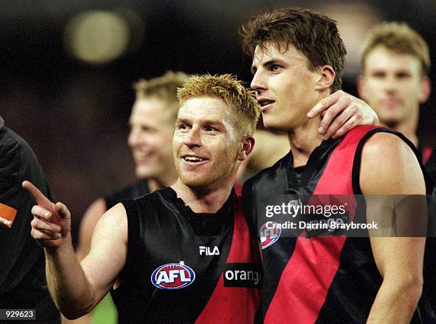 Gary Moorcroft and Matthew Lloyd for Essendon celebrate their victory over Hawthorn during round nine of the AFL season match played between the...