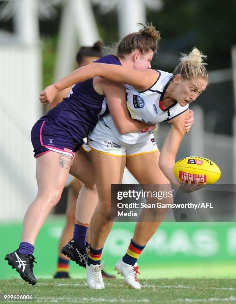 Marijana Rajcic of the Crows attempts to break a tackle during the 2018 AFLW Round 06 match between the Adelaide Crows and the Fremantle Dockers at...