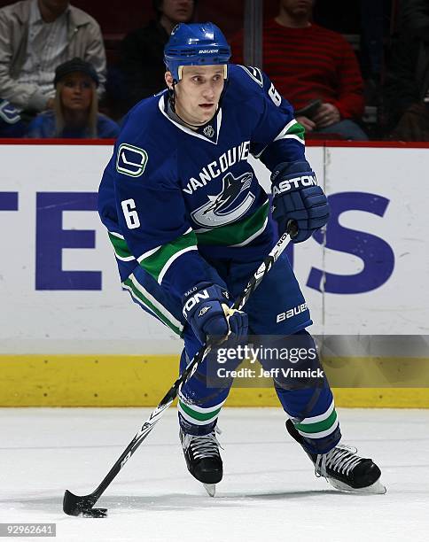 Sami Salo of the Vancouver Canucks skates up ice with the puck during their game against the Colorado Avalanche at General Motors Place on November...