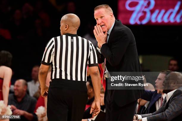 Head coach Chris Mullin of the St. John's Red Storm reacts to the referee against the Georgetown Hoyas during the first round of the Big East...
