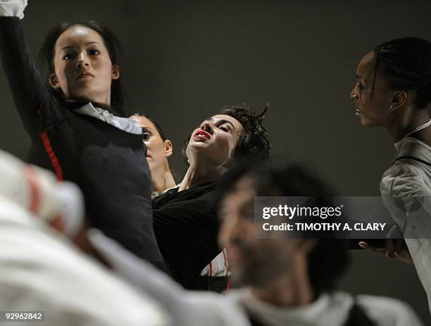 Dancers with the Bill T. Jones/Arnie Zane Dance Company performs a scene from the NYC premiere of "Serenade/The Proposition", one of a suite of works...