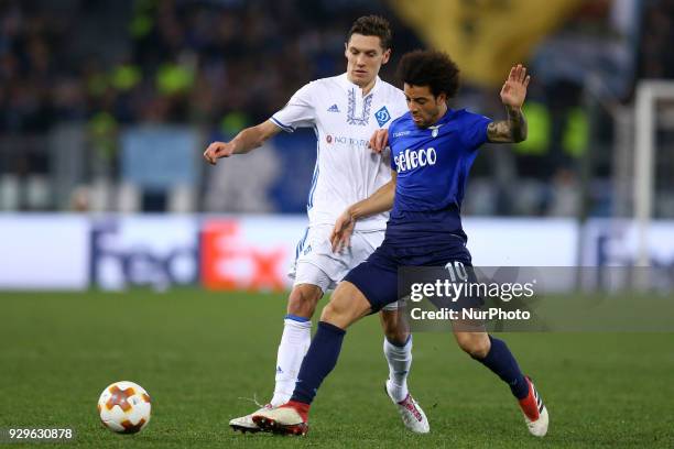 Denys Garmash of Dynamo Kyiv and Felipe Anderson of Lazio during UEFA Europa League Round of 16 - 1st leg match between SS Lazio and FC Dynamo Kyiv...