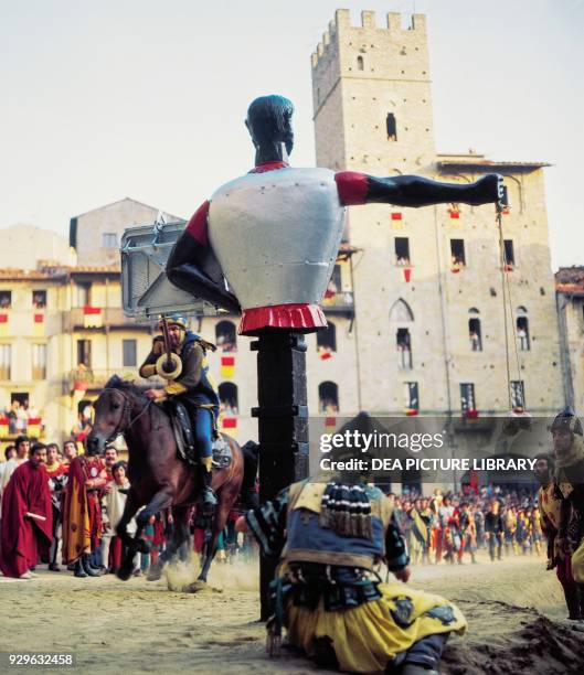 Buratto, spring-loaded metal puppet with shield and flail in its left hand, medieval instrument, Joust of the Saracen, Arezzo, Tuscany, Italy.