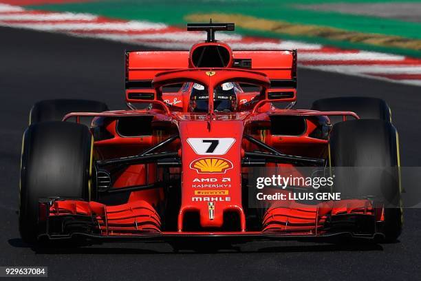 Ferrari's Finnish driver Kimi Raikkonen drives at the Circuit de Catalunya on March 9, 2018 in Montmelo on the outskirts of Barcelona during the...