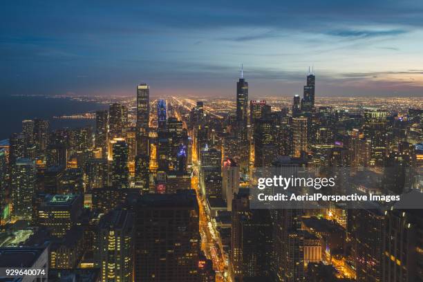 aerial view of chicago skyline at dusk - magnificent mile stock pictures, royalty-free photos & images