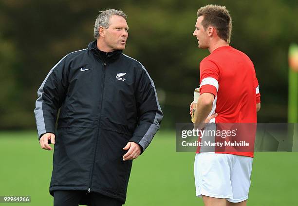 Ricki Herbert head coach of the All Whites discusses tactics with Shane Smeltz during a New Zealand All Whites training session at Endeavour Park on...