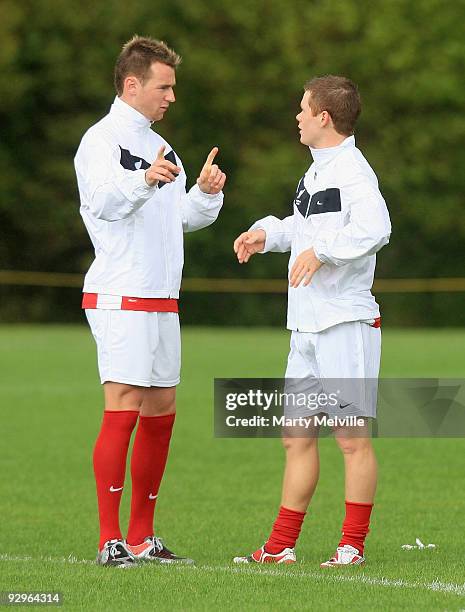 Michael McGlinchey of the All Whites discusses tactics with team mate Shane Smeltz during a New Zealand All Whites training session at Endeavour Park...