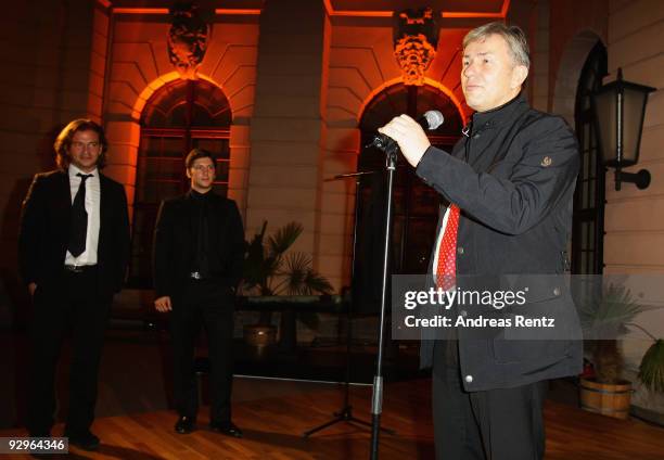 Mayor of Berlin Klaus Wowereit receives the 'Belstaff for Peace' jacket from Michele Malenotti and Manuele Malenotti , vice presidents of Belstaff,...