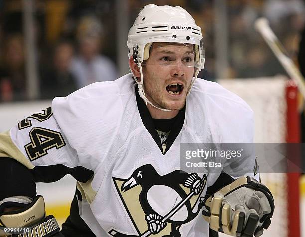 Matt Cooke of the Pittsburgh Penguins reacts after he loses a tooth in the first period against the Boston Bruins on November 10, 2009 at the TD...
