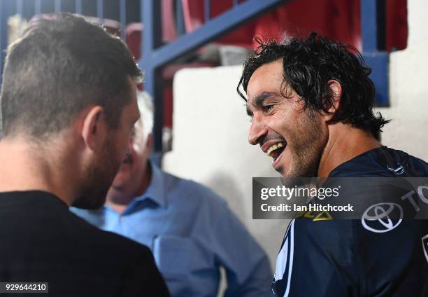 Johnathan Thurston of the Cowboys speaks with friends after the round one NRL match between the North Queensland Cowboys and the Cronulla Sharks at...