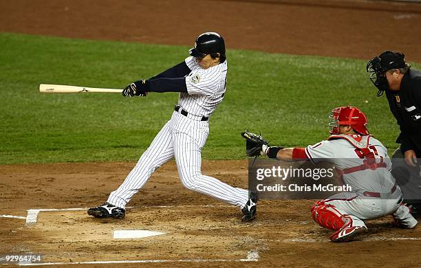 Hideki Matsui of the New York Yankees hits a 2-run home run in the bottom of the second inning against the Philadelphia Phillies in Game Six of the...