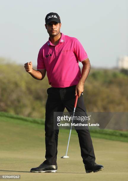 Shubhankar Sharma of India celebrates a birdie putt on the 17th green during day two of the Hero Indian Open at Dlf Golf and Country Club on March 9,...