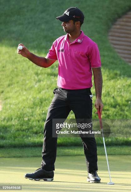 Shubhankar Sharma of India celebrates a birdie on the 15th green during day two of the Hero Indian Open at Dlf Golf and Country Club on March 9, 2018...