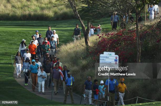 Crowds follow the Shubhankar Sharma group during day two of the Hero Indian Open at Dlf Golf and Country Club on March 9, 2018 in New Delhi, India.