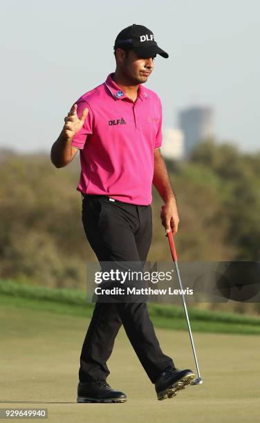 Shubhankar Sharma of India celebrates a birdie putt on the 17th green during day two of the Hero Indian Open at Dlf Golf and Country Club on March 9,...