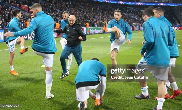 Fitness coach of Real Madrid Antonio Pintus directs the warm up session with Karim Benzema, Cristiano Ronaldo and teammates prior to the UEFA...