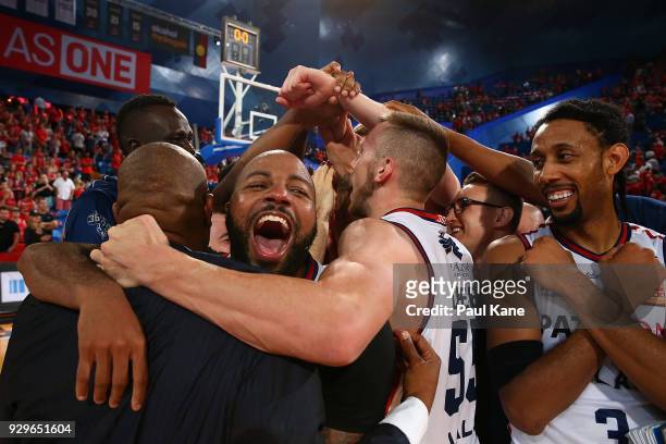Shannon Shorter of the 36ers celebrates with Joey Wright, head coach after winning game two of the NBL Semi Final series between the Adelaide 36ers...