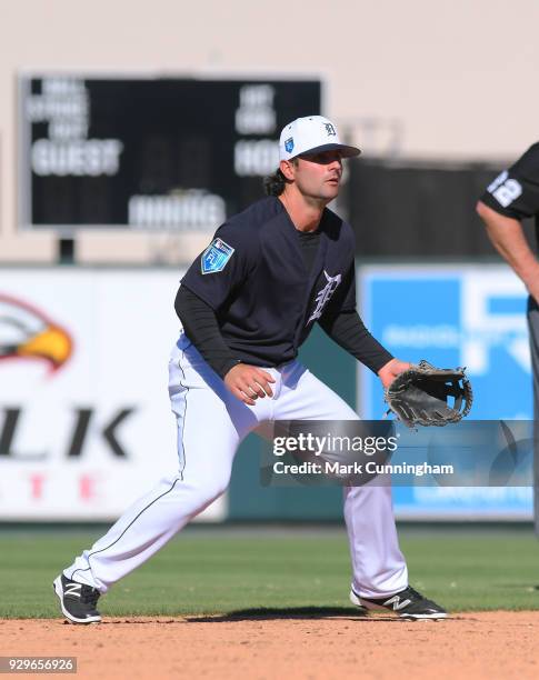 Pete Kozma of the Detroit Tigers fields during the Spring Training game against the Tampa Bay Rays at Publix Field at Joker Marchant Stadium on March...