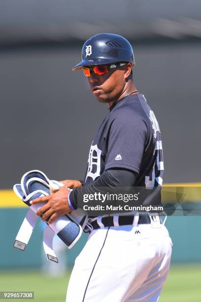 Ramon Santiago of the Detroit Tigers looks on during the Spring Training game against the Tampa Bay Rays at Publix Field at Joker Marchant Stadium on...