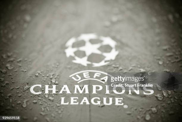 The UEFA Cahmpions League logo si seen on an umbrella prior to the UEFA Europa League Round of 16 match between Borussia Dortmund and FC Red Bull...