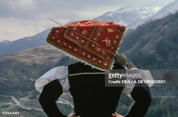 Typical Molise headdress held in pleace with a pin, traditional female costume from Roccamandolfi, Molise, Italy.