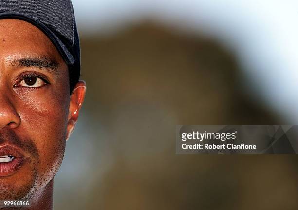 Tiger Woods of the USA speaks to the media on the 18th green during the Pro-Am ahead of the 2009 Australian Masters at Kingston Heath Golf Club on...