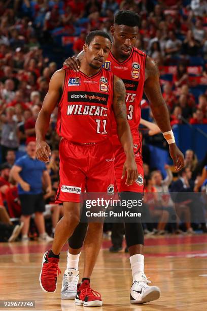 Bryce Cotton and Derek Cooke Jr. Of the Wildcats walk to the bench during game two of the NBL Semi Final series between the Adelaide 36ers and the...