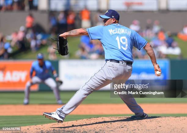 Dustin McGowan of the Tampa Bay Rays pitches during the Spring Training game against the Detroit Tigers at Publix Field at Joker Marchant Stadium on...